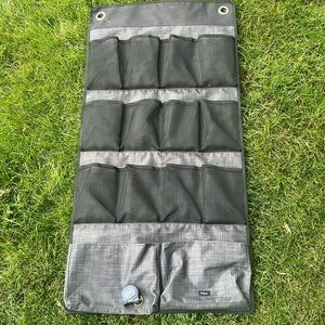 Thirty-one door compartment hanger